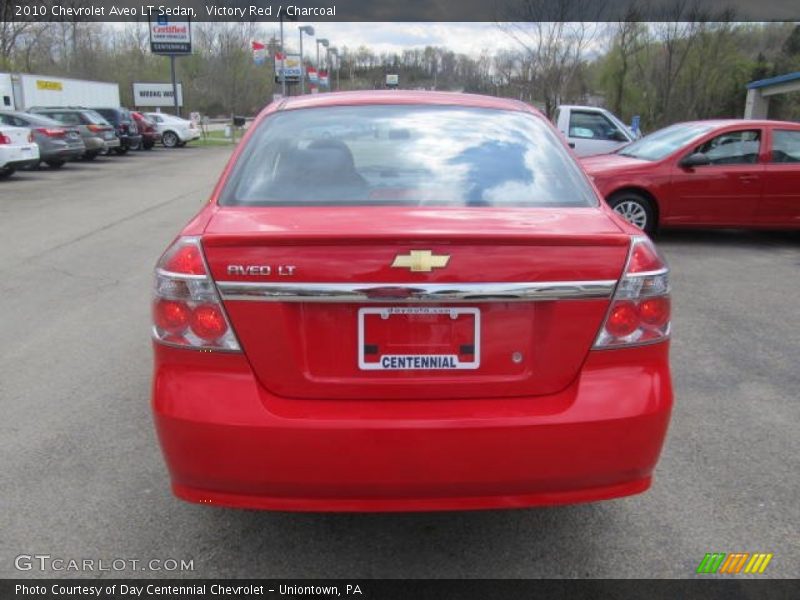 Victory Red / Charcoal 2010 Chevrolet Aveo LT Sedan