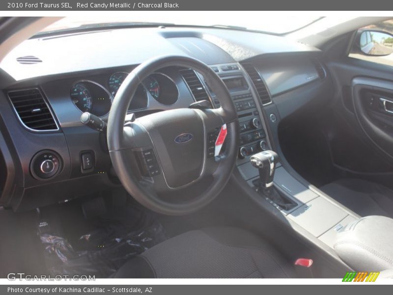 Red Candy Metallic / Charcoal Black 2010 Ford Taurus SEL