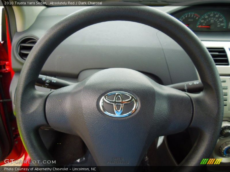 Absolutely Red / Dark Charcoal 2010 Toyota Yaris Sedan