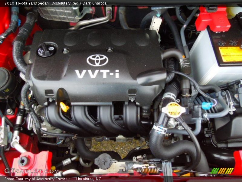 Absolutely Red / Dark Charcoal 2010 Toyota Yaris Sedan