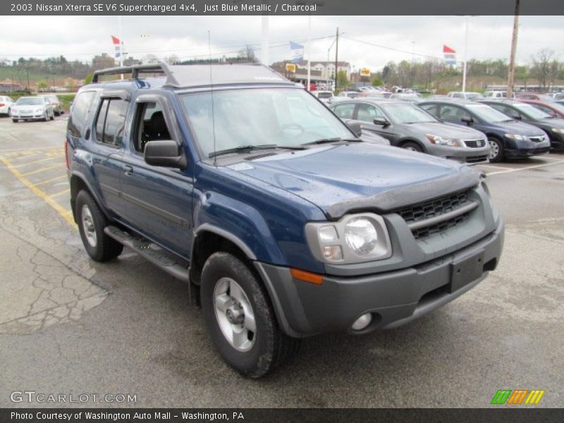 Front 3/4 View of 2003 Xterra SE V6 Supercharged 4x4