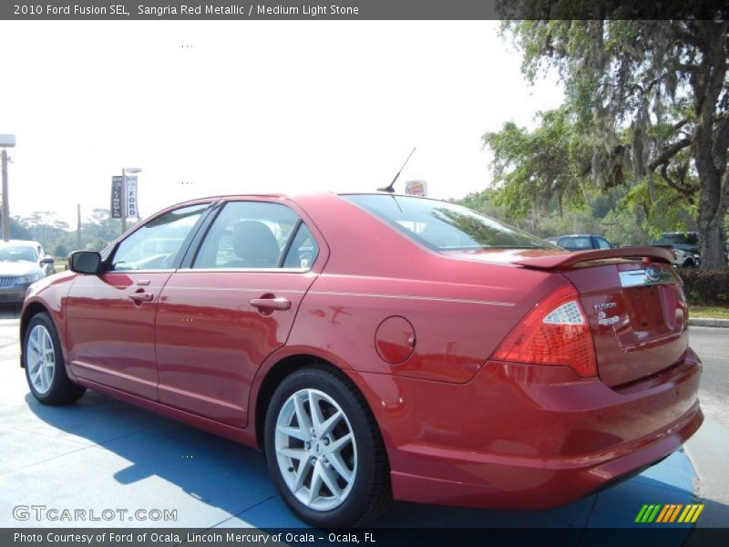 Sangria Red Metallic / Medium Light Stone 2010 Ford Fusion SEL