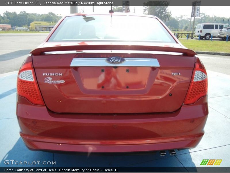 Sangria Red Metallic / Medium Light Stone 2010 Ford Fusion SEL