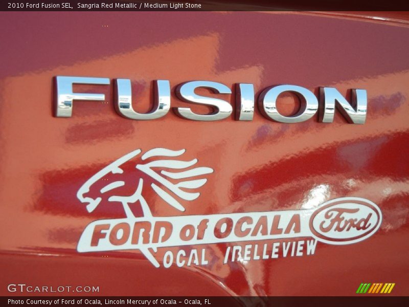 Sangria Red Metallic / Medium Light Stone 2010 Ford Fusion SEL