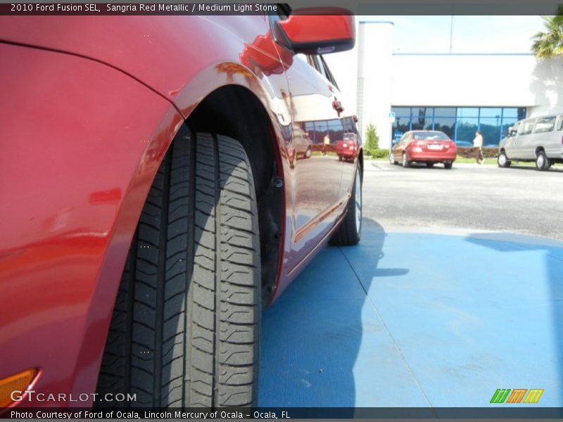 Sangria Red Metallic / Medium Light Stone 2010 Ford Fusion SEL