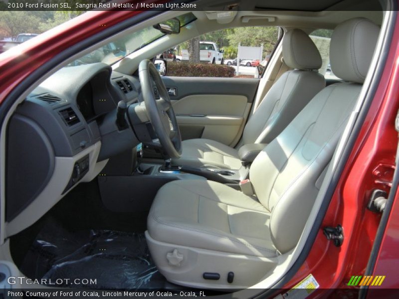 Sangria Red Metallic / Medium Light Stone 2010 Ford Fusion SEL