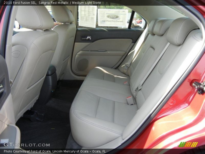 Sangria Red Metallic / Medium Light Stone 2010 Ford Fusion SEL