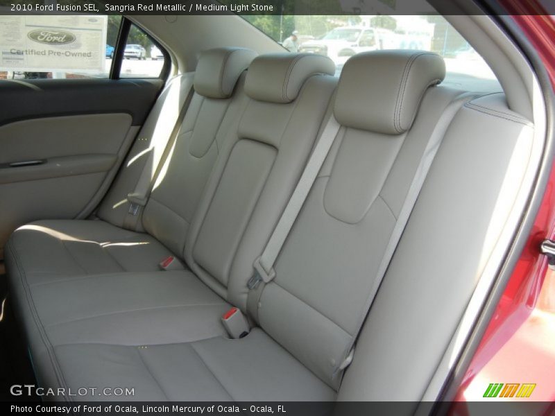 Sangria Red Metallic / Medium Light Stone 2010 Ford Fusion SEL