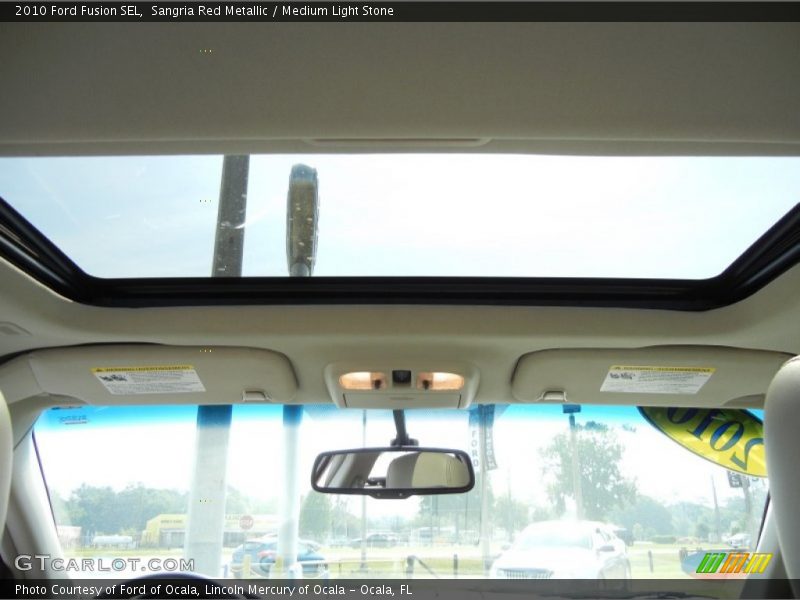 Sangria Red Metallic / Medium Light Stone 2010 Ford Fusion SEL