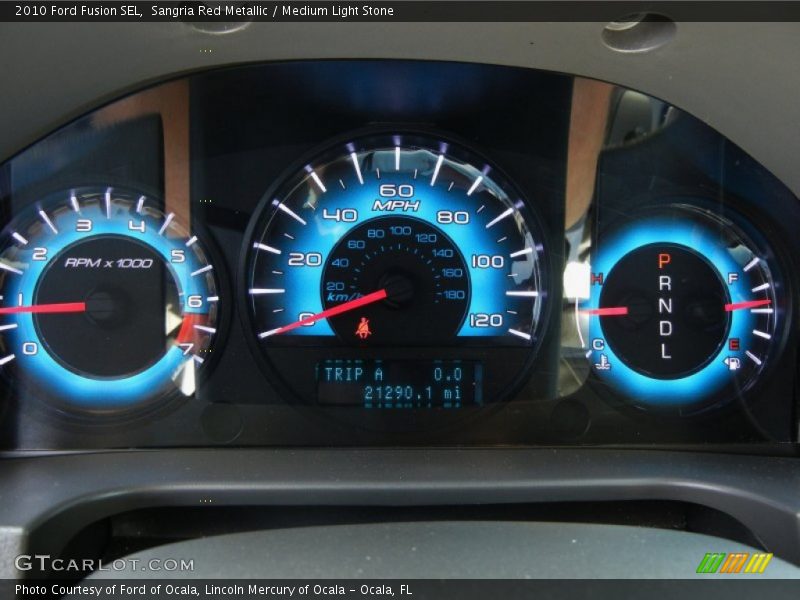 Sangria Red Metallic / Medium Light Stone 2010 Ford Fusion SEL