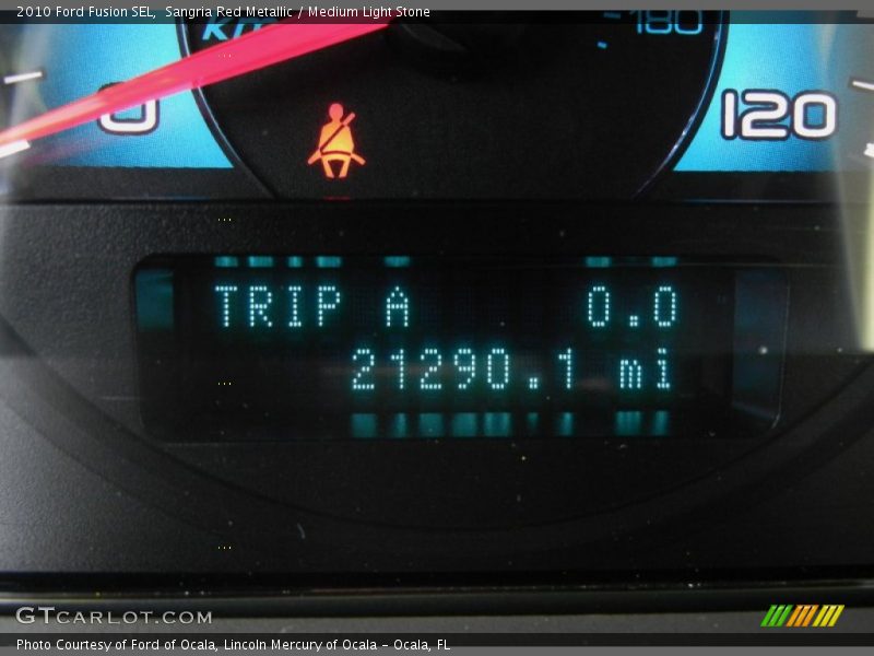 Sangria Red Metallic / Medium Light Stone 2010 Ford Fusion SEL