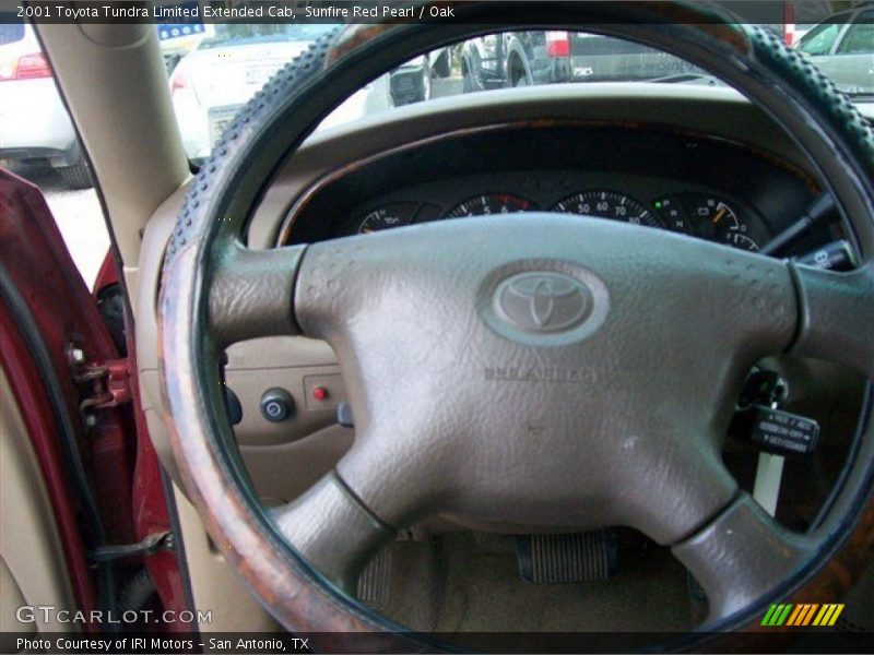 Sunfire Red Pearl / Oak 2001 Toyota Tundra Limited Extended Cab
