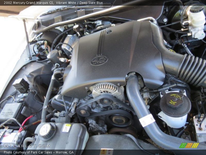 Vibrant White / Deep Slate Blue 2002 Mercury Grand Marquis GS