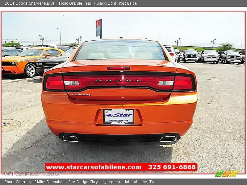 Toxic Orange Pearl / Black/Light Frost Beige 2011 Dodge Charger Rallye