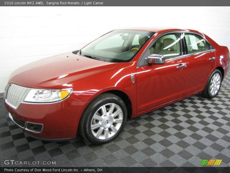 Sangria Red Metallic / Light Camel 2010 Lincoln MKZ AWD