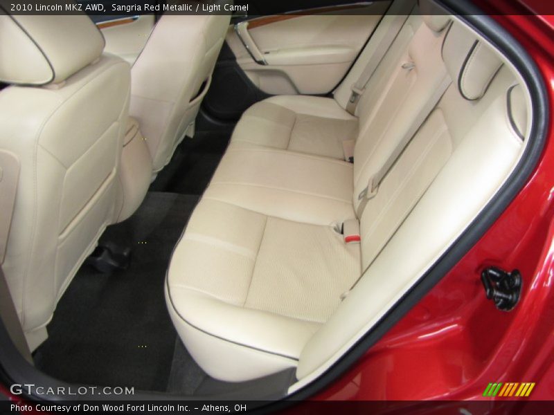 Sangria Red Metallic / Light Camel 2010 Lincoln MKZ AWD