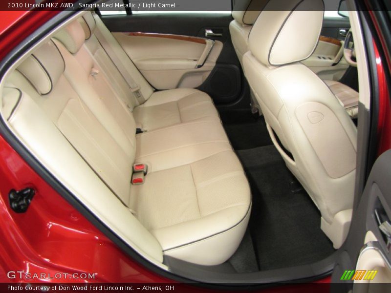 Sangria Red Metallic / Light Camel 2010 Lincoln MKZ AWD