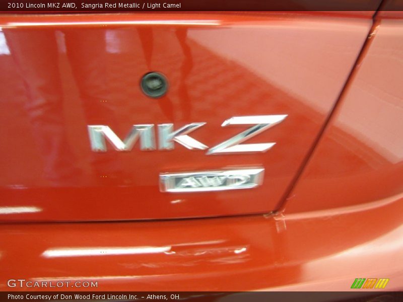 Sangria Red Metallic / Light Camel 2010 Lincoln MKZ AWD