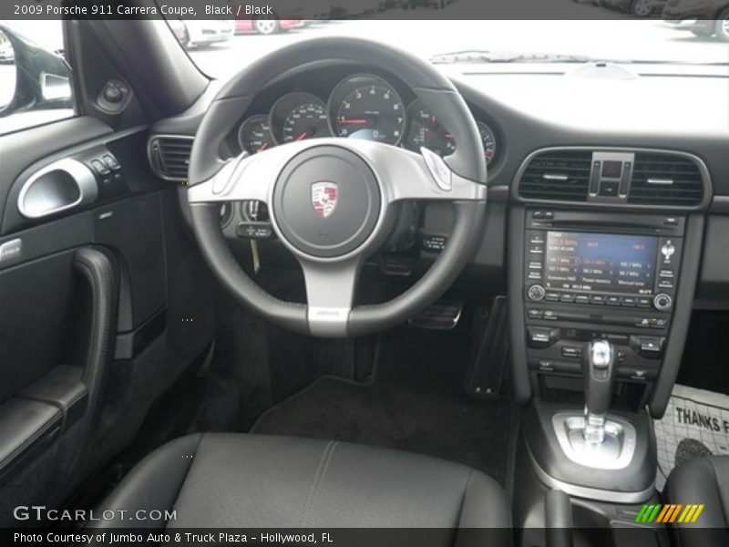 Black / Black 2009 Porsche 911 Carrera Coupe