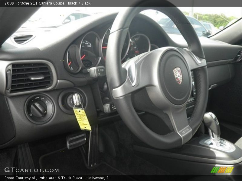 Black / Black 2009 Porsche 911 Carrera Coupe