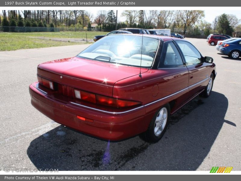 Light Toreador Red Metallic / Graphite 1997 Buick Skylark Custom Coupe