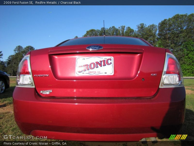 Redfire Metallic / Charcoal Black 2009 Ford Fusion SE