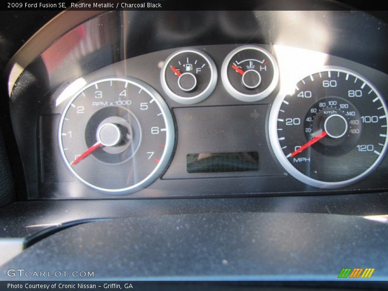 Redfire Metallic / Charcoal Black 2009 Ford Fusion SE