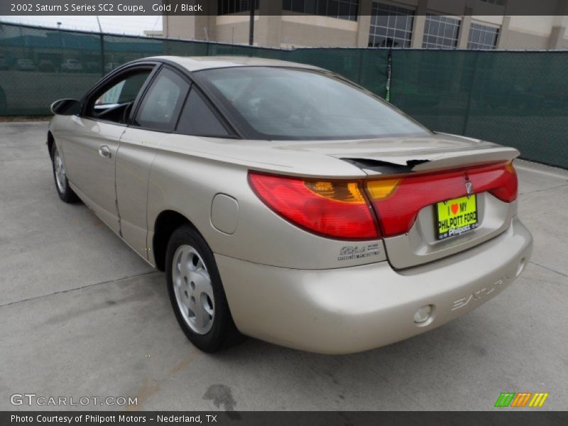 Gold / Black 2002 Saturn S Series SC2 Coupe