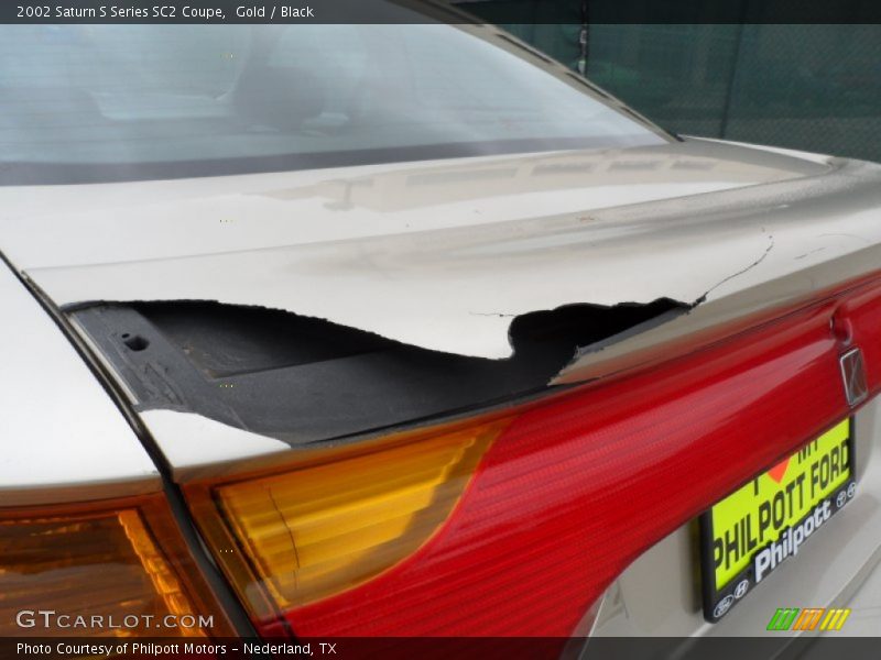 Gold / Black 2002 Saturn S Series SC2 Coupe