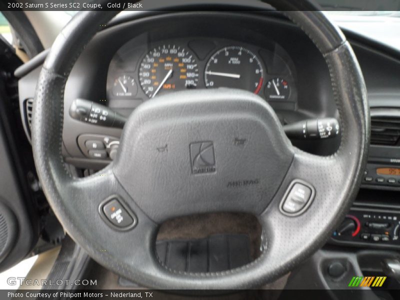 Gold / Black 2002 Saturn S Series SC2 Coupe