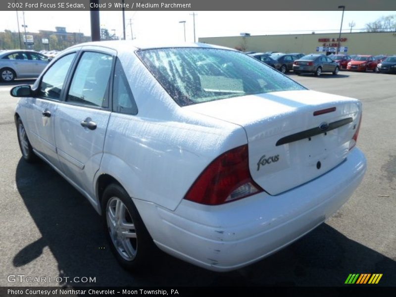 Cloud 9 White / Medium Parchment 2002 Ford Focus SE Sedan