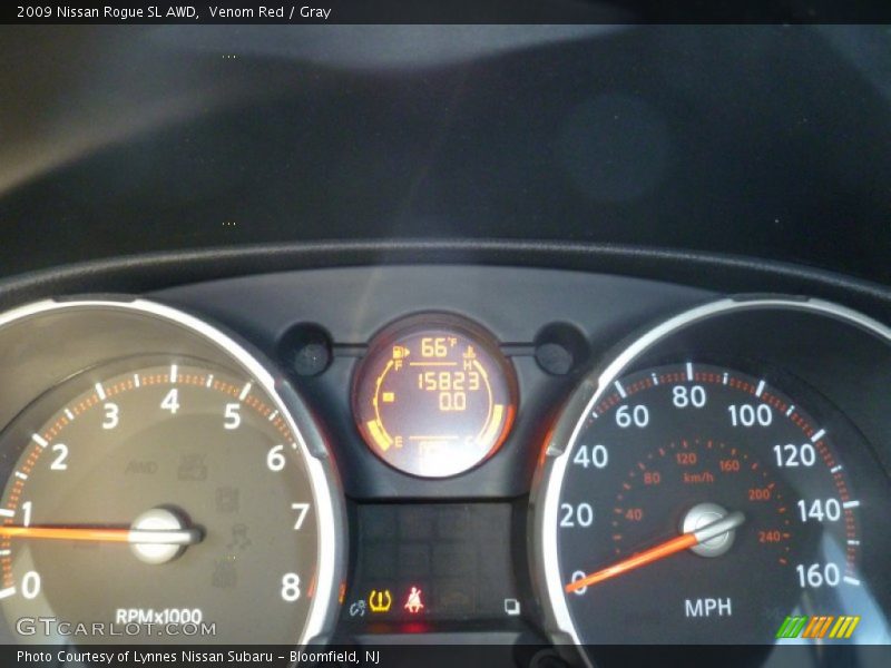 Venom Red / Gray 2009 Nissan Rogue SL AWD