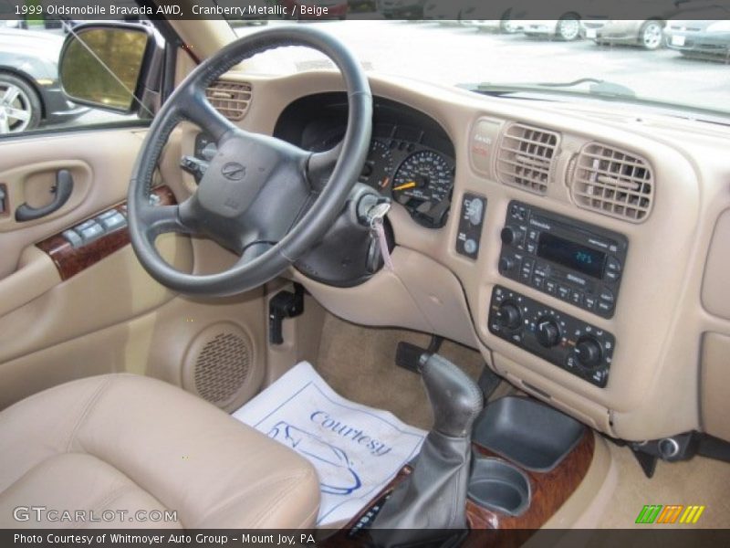 Cranberry Metallic / Beige 1999 Oldsmobile Bravada AWD
