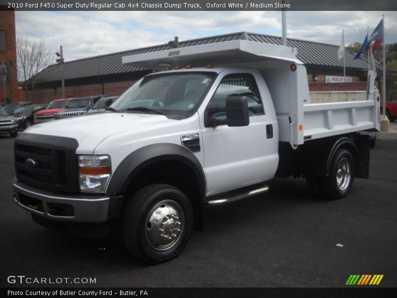 Front 3/4 View of 2010 F450 Super Duty Regular Cab 4x4 Chassis Dump Truck