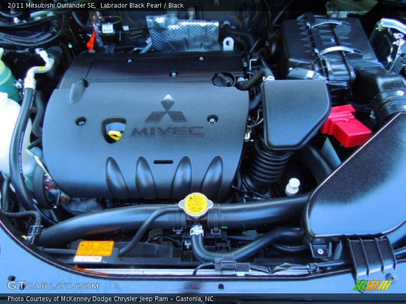 Labrador Black Pearl / Black 2011 Mitsubishi Outlander SE