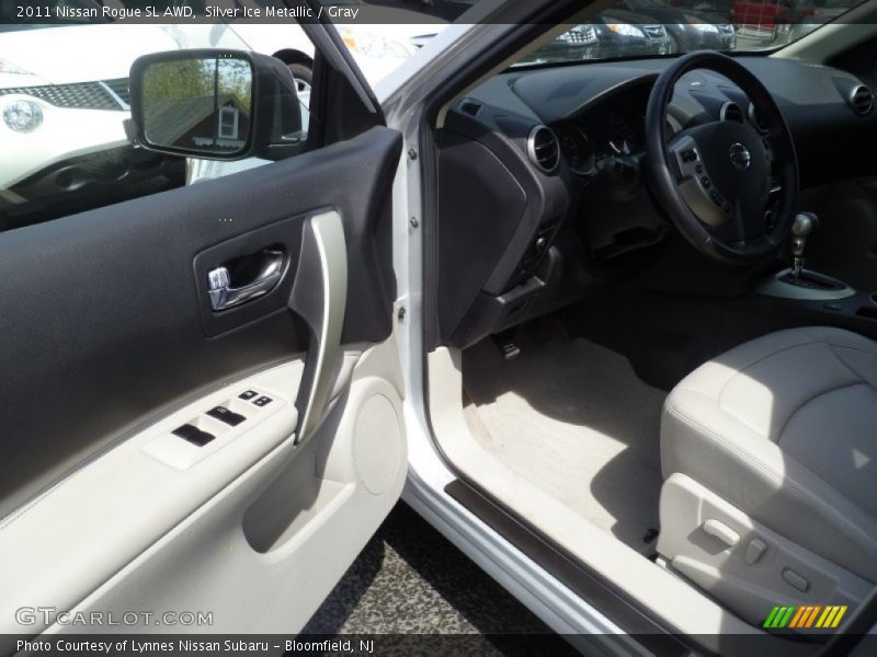 Silver Ice Metallic / Gray 2011 Nissan Rogue SL AWD