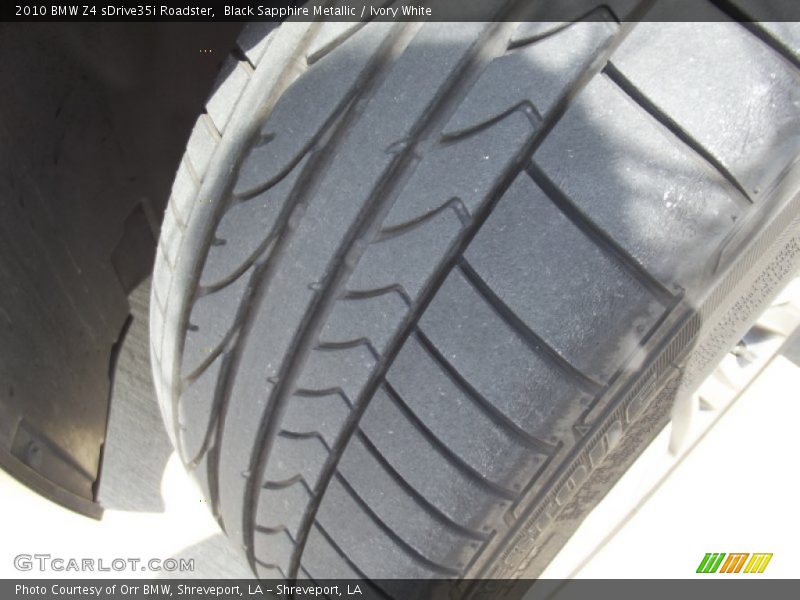 Black Sapphire Metallic / Ivory White 2010 BMW Z4 sDrive35i Roadster