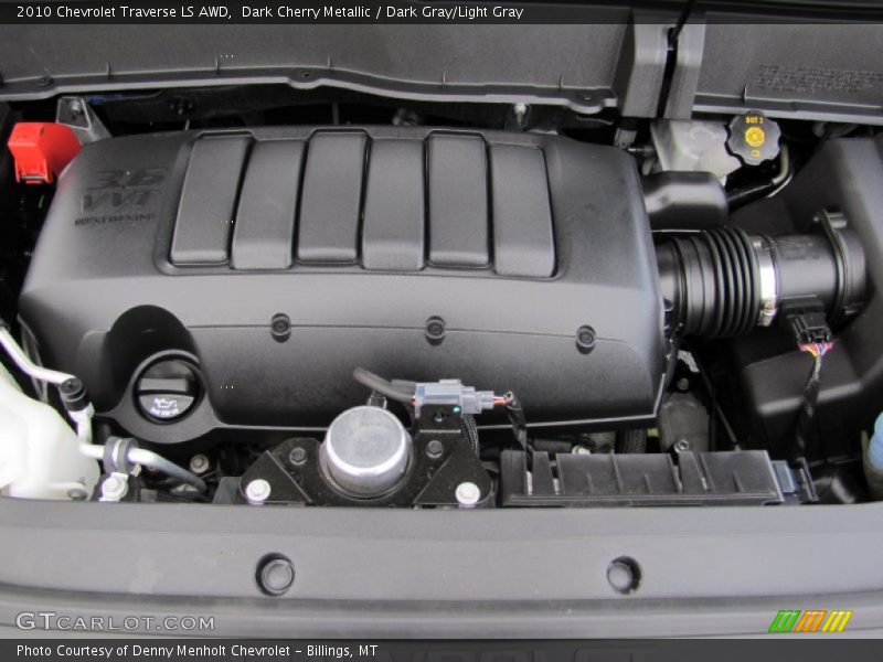 Dark Cherry Metallic / Dark Gray/Light Gray 2010 Chevrolet Traverse LS AWD