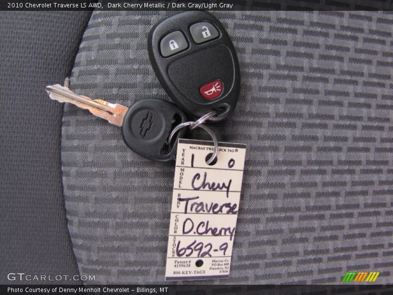 Dark Cherry Metallic / Dark Gray/Light Gray 2010 Chevrolet Traverse LS AWD