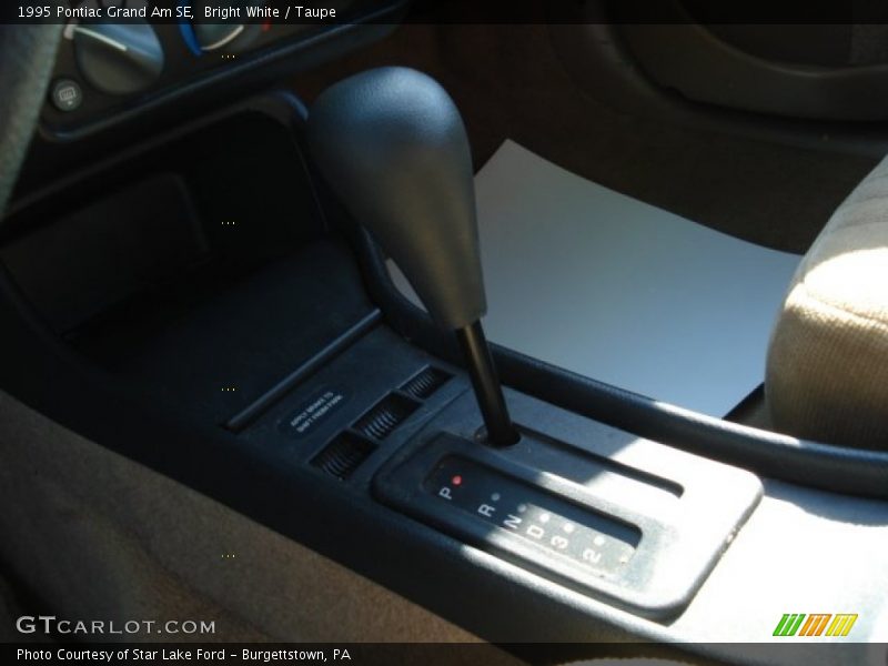 Bright White / Taupe 1995 Pontiac Grand Am SE