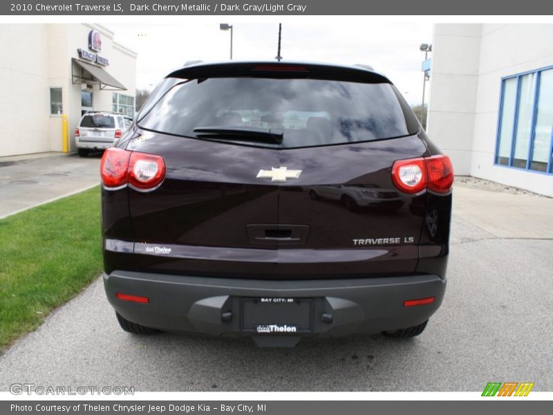 Dark Cherry Metallic / Dark Gray/Light Gray 2010 Chevrolet Traverse LS