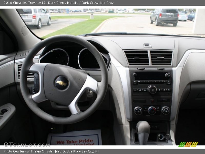Dark Cherry Metallic / Dark Gray/Light Gray 2010 Chevrolet Traverse LS