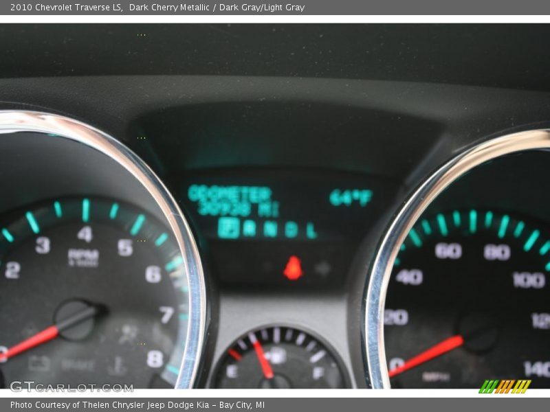 Dark Cherry Metallic / Dark Gray/Light Gray 2010 Chevrolet Traverse LS