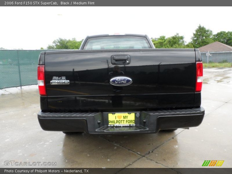 Black / Medium Flint 2006 Ford F150 STX SuperCab