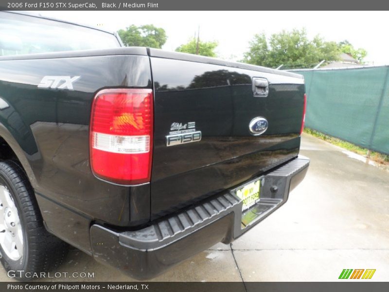 Black / Medium Flint 2006 Ford F150 STX SuperCab
