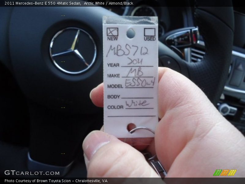 Arctic White / Almond/Black 2011 Mercedes-Benz E 550 4Matic Sedan