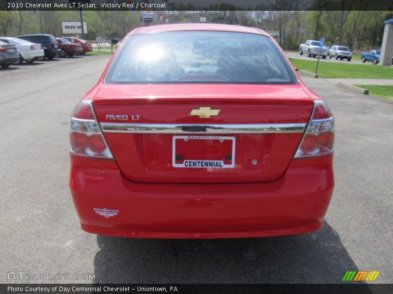 Victory Red / Charcoal 2010 Chevrolet Aveo LT Sedan