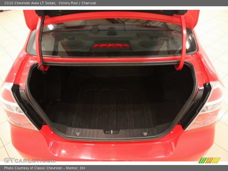 Victory Red / Charcoal 2010 Chevrolet Aveo LT Sedan