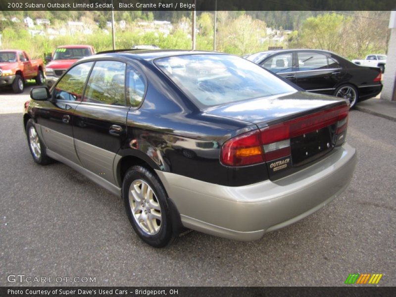 Black Granite Pearl / Beige 2002 Subaru Outback Limited Sedan
