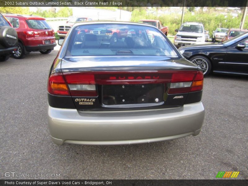 Black Granite Pearl / Beige 2002 Subaru Outback Limited Sedan